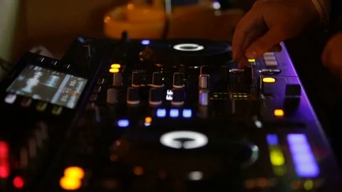 Playing dance music in deejay consolle Stock Footage 79721398
