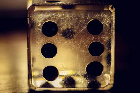 Playing dice on a table with beautiful backlight 스톡 사진