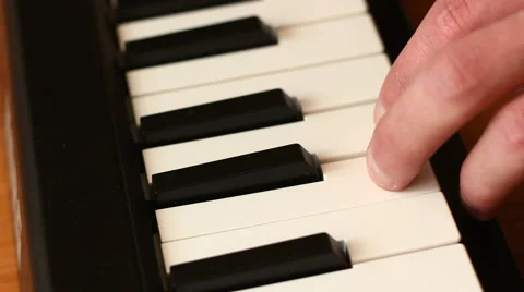 Playing the Digital Keyboard Stock-Footage 49060564