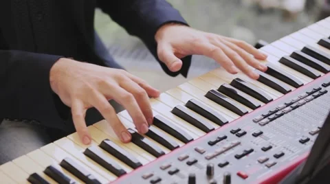 Playing the Digital Keyboard Stock Footage 51814769