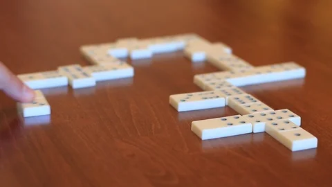 Playing domino on table Stock Footage 88224420