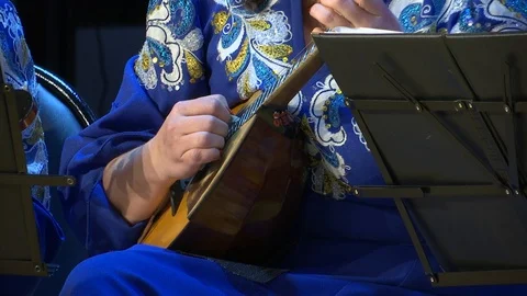 Playing the domra. Stock Footage 120178543
