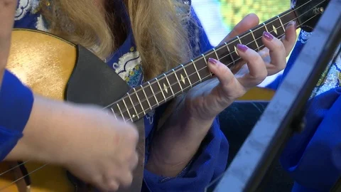 Playing the domra. Stock Footage 120178590