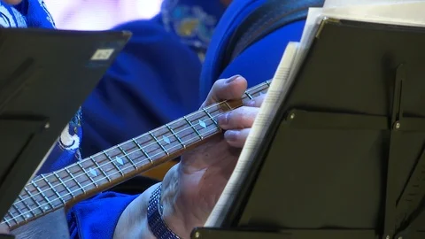 Playing the domra. Stock Footage 120178671