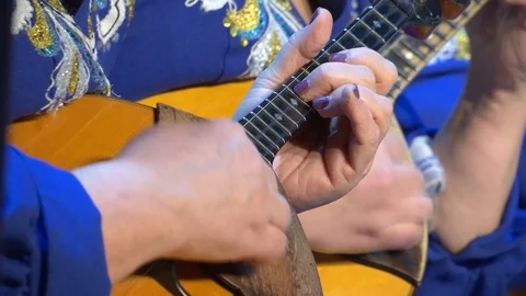 Playing the domra. Stock Footage 120178834