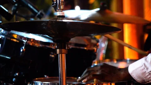 Playing drum &amp; bells, close up night Stock Footage 113212822