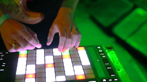Playing the drum machine at a concert Video stock 147946891
