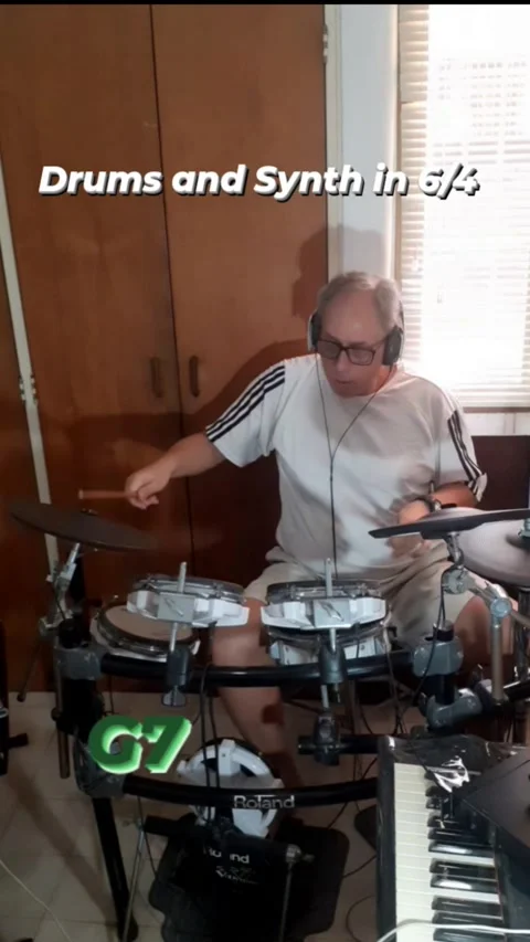 Playing Drums in 6/4 over a Synth track. Video stock 280801037