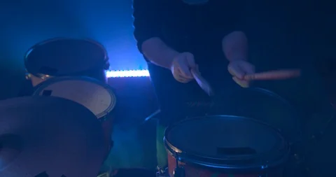 Playing the Drums on a Dark Stage Stock Footage 98952424
