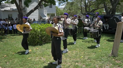 Playing drums in the drumline section of a marching band in Florida Stock Footage 50959771