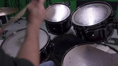 Playing Drums energetically Stock Footage 81830396