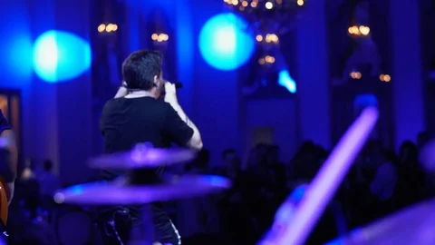 Playing Drums Percussion Lead Singer Instrument Band at Concert Live Performance 스톡 동영상 127626135