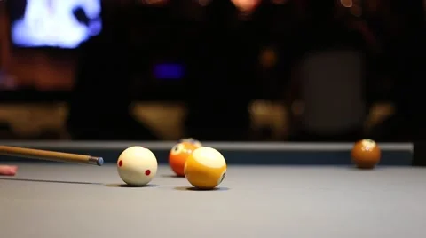 Playing Eight-ball pool billiards in a bar Stock Footage 51780256