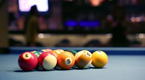 Playing Eight-ball pool billiards in a bar Stock Footage 58452232