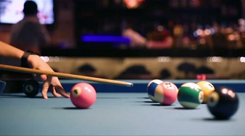 Playing Eight-ball pool billiards in a bar Stock Footage 58452887
