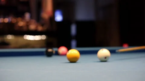 Playing Eight-ball pool billiards in a bar Stock Footage 58453662