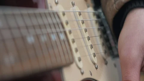 Playing an electric Guitar 4K stock footage close up hands detail Stock Footage