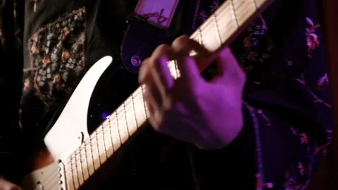Playing electric guitar close up performance at night Stock Footage 247898347