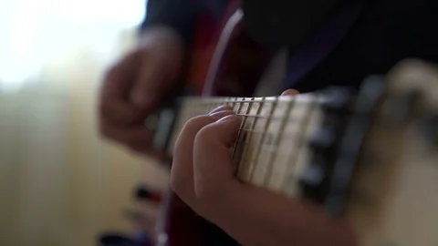 Playing electric guitar Stock Footage 73577948