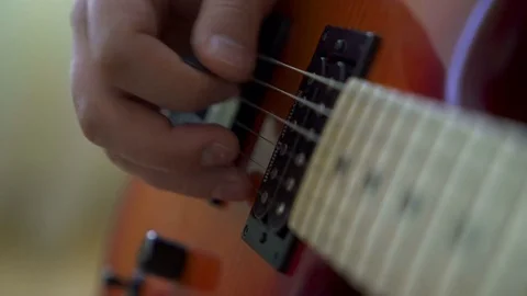 Playing electric guitar Stock Footage 73577987