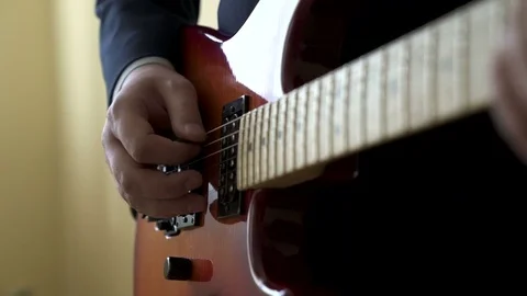 Playing electric guitar Stock Footage 73577989
