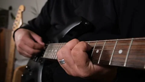Playing electric guitar Stock Footage 199317354
