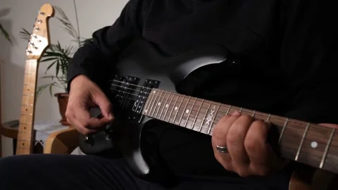 Playing electric guitar Stock Footage 208881772