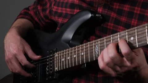 Playing electric guitar Stock Footage 228990505