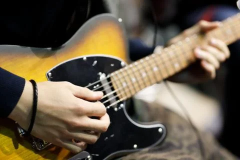 Playing electric guitar Stock Photos
