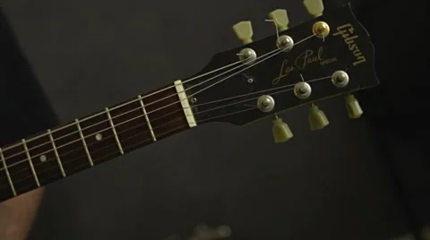 Playing Electric Guitar in the Recording Studio Stock Footage 68630735