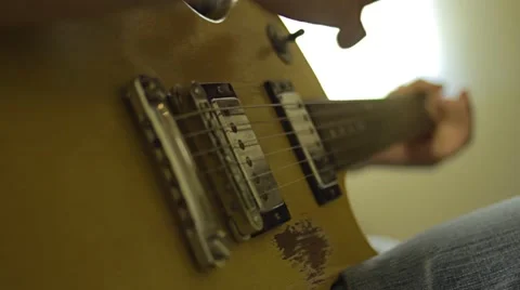 Playing Electric Guitar in the Recording Studio Stock Footage 68630857
