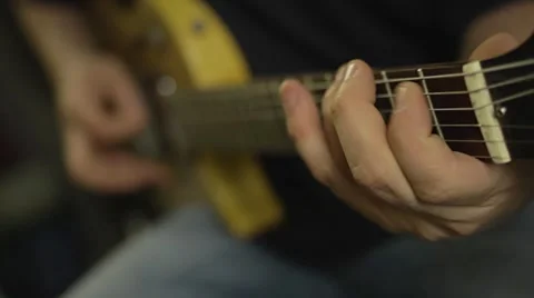 Playing Electric Guitar in the Recording Studio Stock Footage 68631009