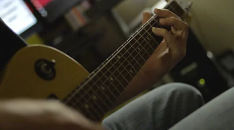 Playing Electric Guitar in the Recording Studio Stock Footage 68631047