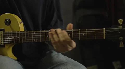Playing Electric Guitar in the Recording Studio Stock Footage 68631074