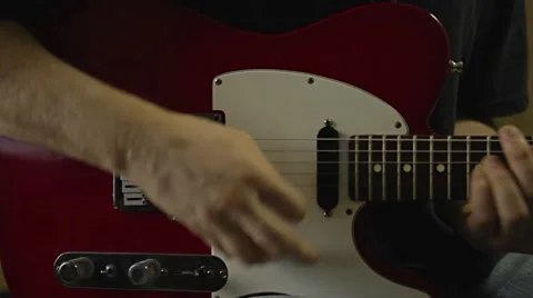 Playing Electric Guitar in the Recording Studio Stock Footage 68631187