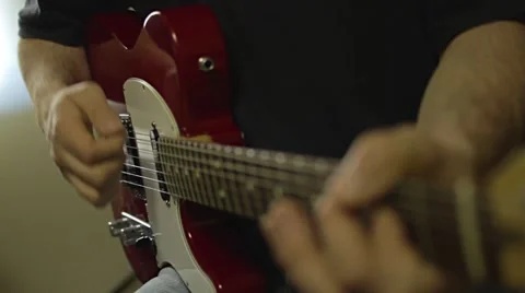 Playing Electric Guitar in the Recording Studio Stock Footage 68631424