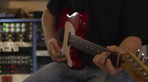 Playing Electric Guitar in the Recording Studio Stock Footage 68631443