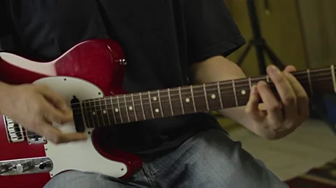 Playing Electric Guitar in the Recording Studio Stock Footage 68631463