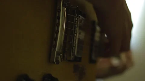 Playing Electric Guitar in the Recording Studio Stock Footage 68631496