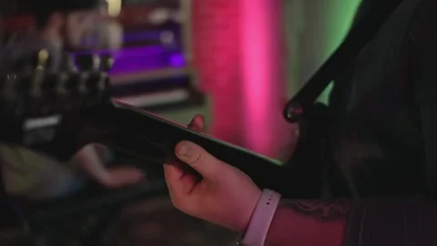 Playing an Electric Guitar viewed from the back. Stock Footage 272288156