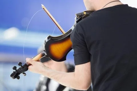 Playing electric violin 스톡 사진