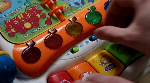 Playing With An Electronic Children's Toy Stock Footage 37961460