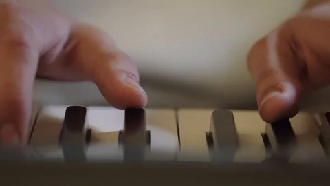 Playing electronic piano Stock Footage 101575633