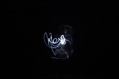 Playing with flashlight in the dark night Stock Photos