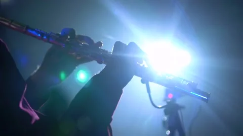 Playing the flute, close-up of hands and flutes with blue glare fill Video stock 144437687