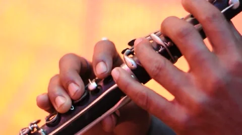 Playing flute Stock Footage 49526379