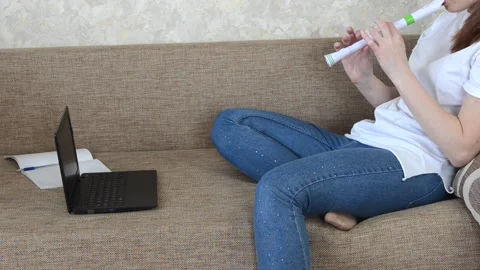 Playing flute Stock Footage 152803155