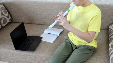 Playing flute Stock Footage 152803530