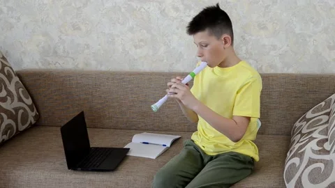 Playing flute Stock Footage 152803563