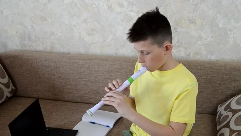 Playing flute Stock Footage 152803564